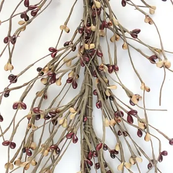 Mustard and burgundy pip berry garland displayed as primitive farmhouse and country home decor