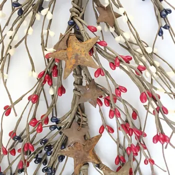 Red white and blue pip berry garland with rustic metal stars for patriotic farmhouse and country home decor
