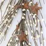 White pip berry garland with rusty stars for primitive farmhouse, country, and rustic home decor