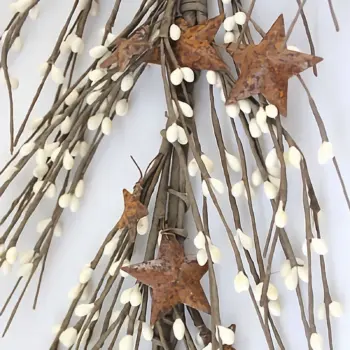 White pip berry garland with rusty stars for primitive farmhouse, country, and rustic home decor