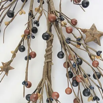 Brown, blue, and mustard pip berry garland with rusty stars on a flexible wire base for rustic farmhouse home décor