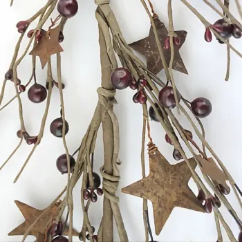 Burgundy pip berry garland with rusty stars for primitive country farmhouse decorating