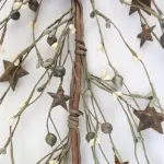 Cream, green and brown pip berry garland with rusty star accents for primitive farmhouse and country home decor